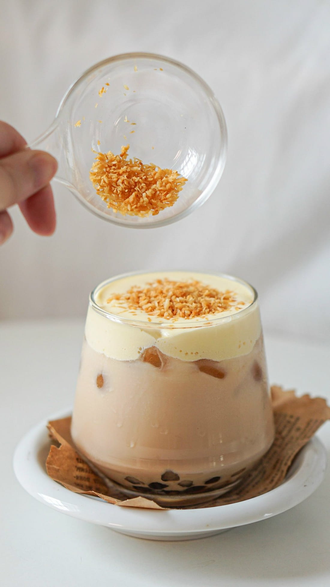 Trà sữa kem dừa nướng topping trân châu đen